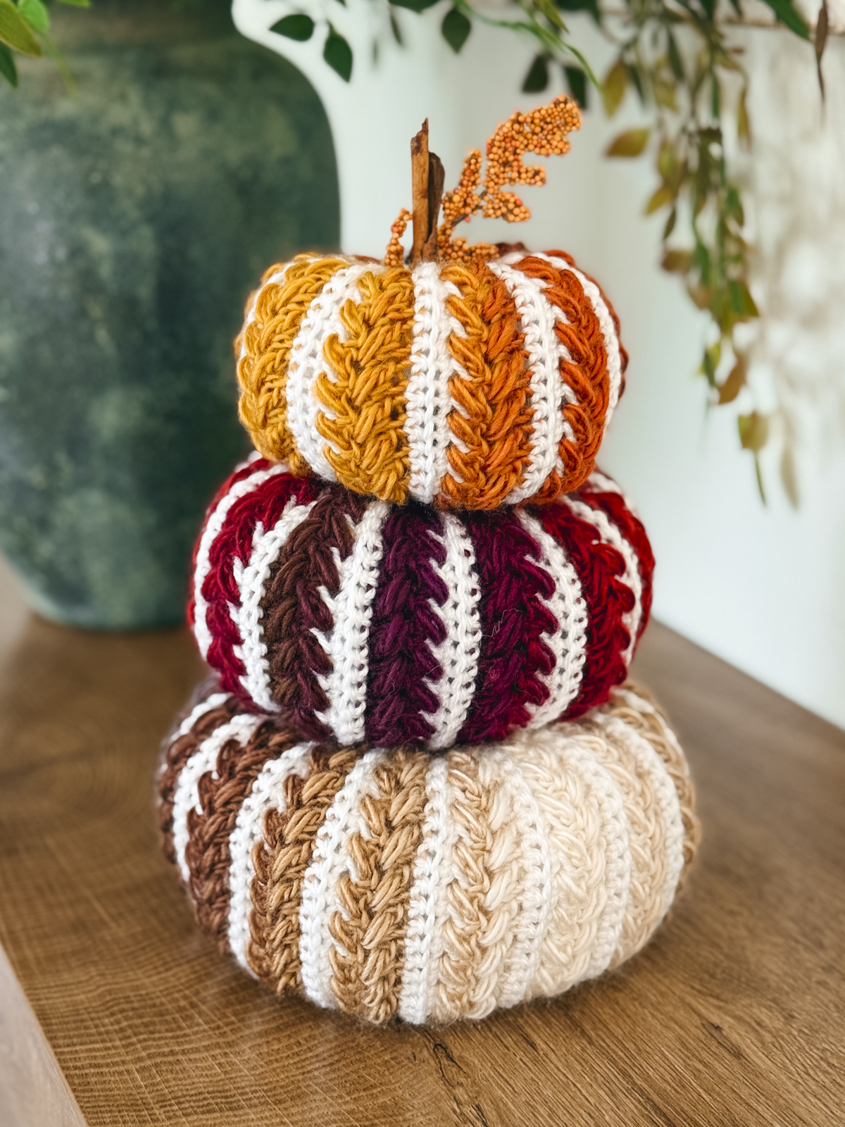 Stacked Wheat Stitch Crochet Pumpkins in mustard, burgundy and cream stripes