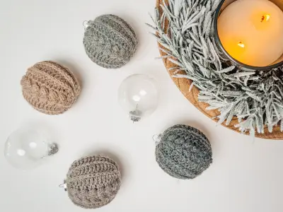 Autumn Wheat Bauble Ornaments in gray and oatmeal scattered beside clear ornament shells