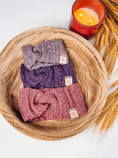 Autumn Wheat Ear Warmers in lavender, purple and rose in a wooden bowl