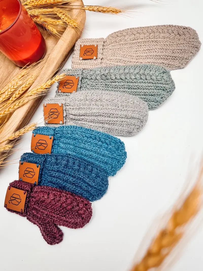 Autumn Wheat Flat Crochet Mittens in oatmeal, sage, blue and plum fanned out