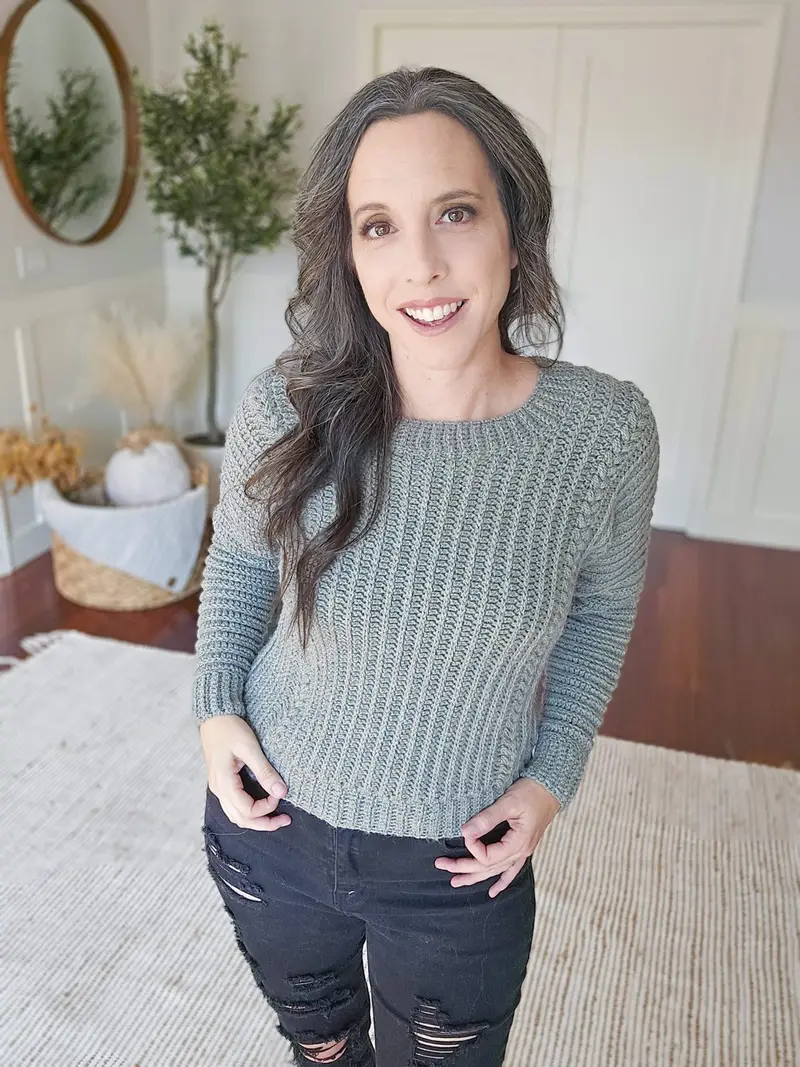 Woman wearing the gray Autumn Wheat Flat Sweater, a fitted crew neck pullover
