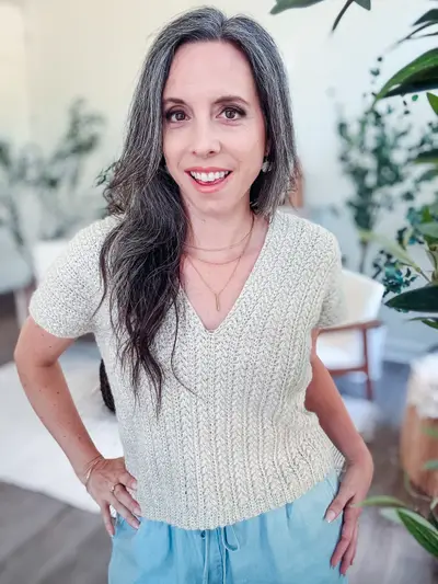 Woman wearing the cream Braided Wheat Easy Summer Top, a short sleeve V neck tee