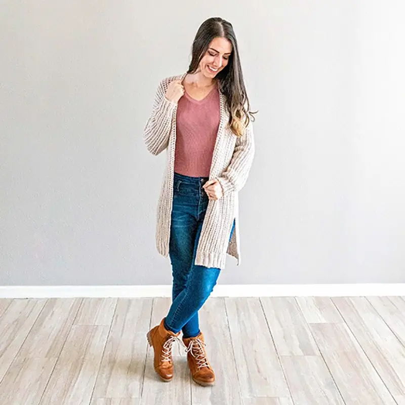 Full length view of the long cream Campside Crochet Cardigan with jeans and boots