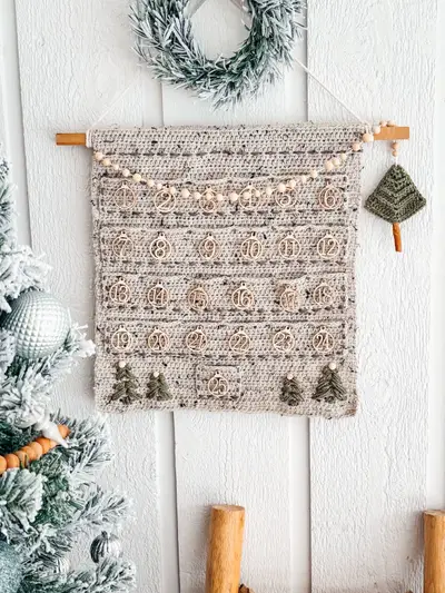 Christmas Wall Advent Calendar in oatmeal with numbered pockets, wood beads and a tree ornament