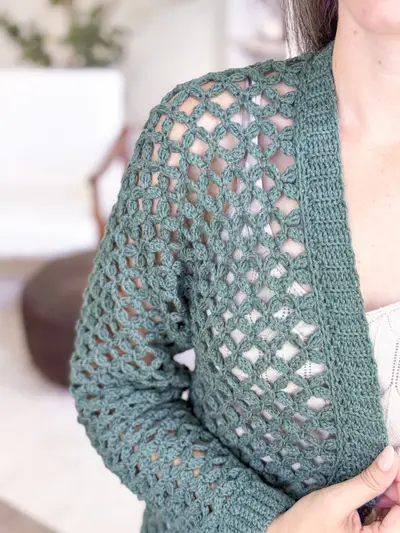 Close up of the lace sleeve on the green Circle Leaf Lace Cardigan