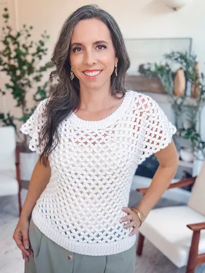 Woman wearing the white Circle Leaf Lace Crochet Summer Top