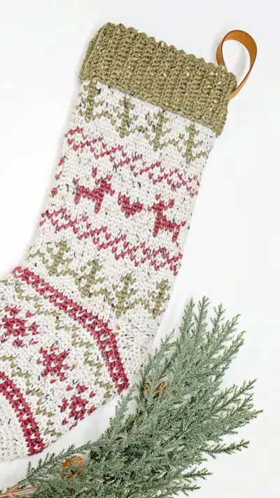Close up of the deer and tree colorwork on the Classic Christmas Crochet Stocking