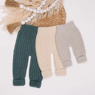 Cutest Baby Cuffed Pants in dark green, cream and gray laid flat