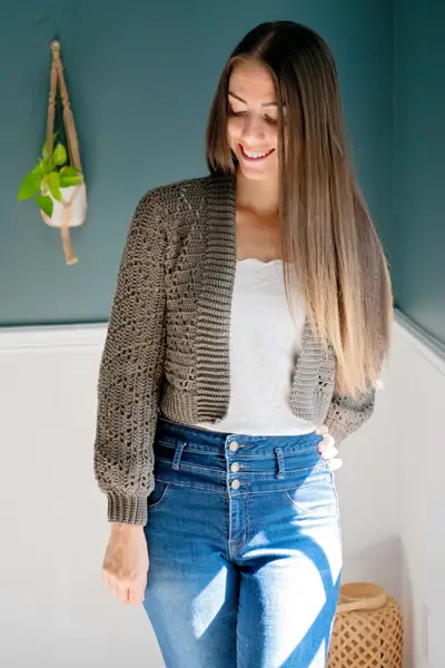 Brown Diamond Crochet Cardigan with a cropped length worn with jeans