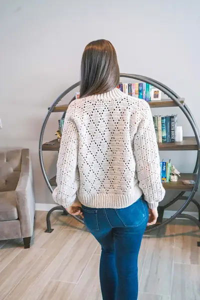 Back view of the light gray Diamond Crochet Cardigan showing the diamond lace pattern