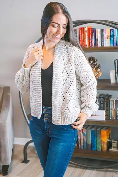 Smiling woman in the light gray Diamond Crochet Cardigan
