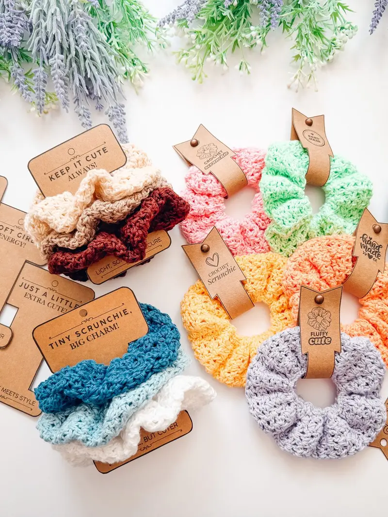 Double Bloom Scrunchies in many colors on kraft paper hang tags