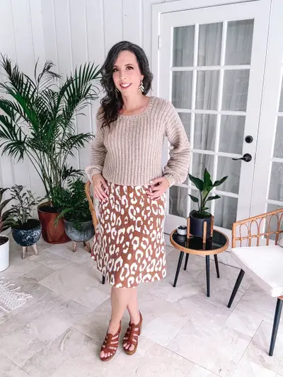Oatmeal Dove Pullover worn with a leopard print skirt