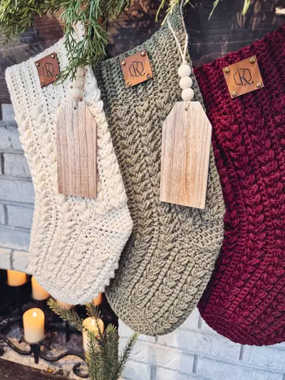 Close up of the wheat stitch texture on cream, sage and burgundy Festive Wheat Stockings