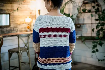 Back view of the gray, navy and red striped Gingersnap Pullover
