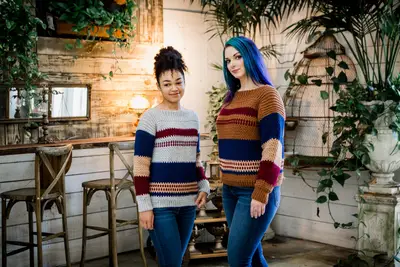 Two models wearing Gingersnap Pullovers in different stripe colorways