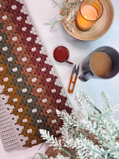Shades of Diamonds stitch panel with coffee, a candle and scissors