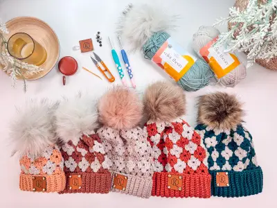 Harvest Hues Crochet Beanies in rust, red, pink and teal with pom poms