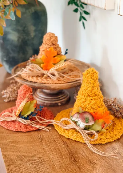 Home Decor Witch Hat Trio in orange, mustard and rust on a wooden stand