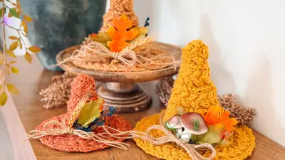 Witch Hat Trio in orange and mustard on a wooden riser