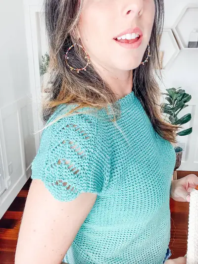 Close up of the teal short sleeve Lovely Lace Crochet Sweater