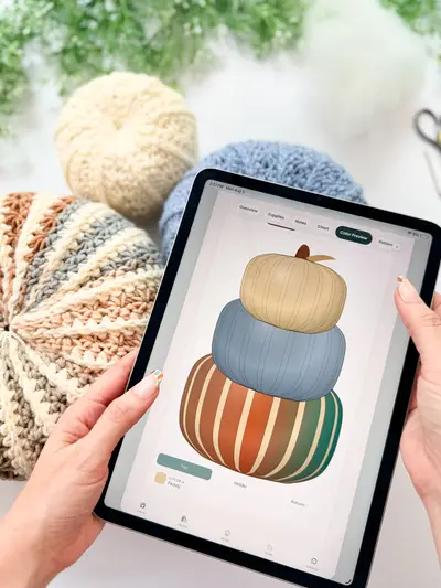 Tablet showing a pumpkin stack preview in cream, blue and striped colors