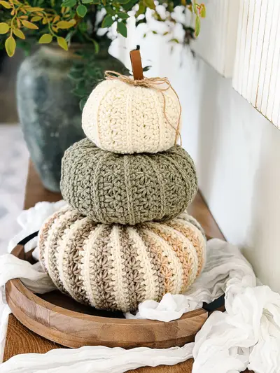 Stacked Petal Loop Stitch Pumpkins in cream, sage and a cream striped pumpkin