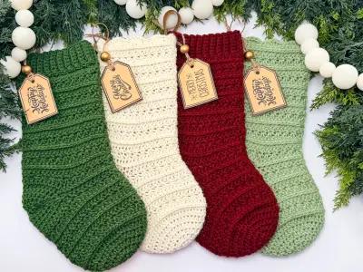 Petal Loop Stitch Stockings in green, cream, red and sage with wooden name tags