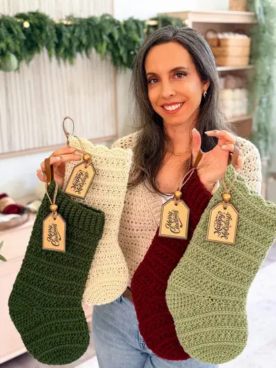 Woman showing Petal Loop Stitch Stockings in four colors