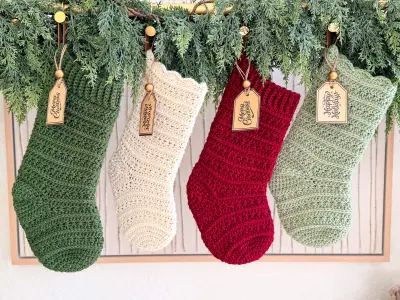 Petal Loop Stitch Stockings hanging from a garland