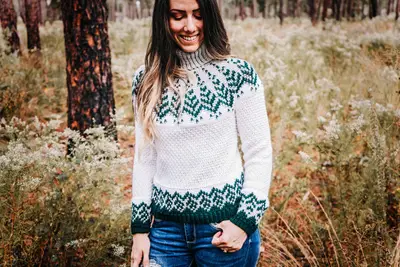 Pine Fair Isle Crochet Sweater worn outdoors with jeans