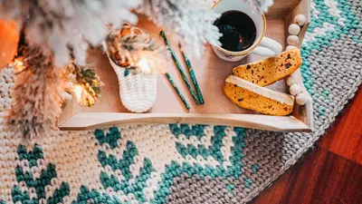 Pine Christmas Tree Skirt with a tray of cookies and a mug