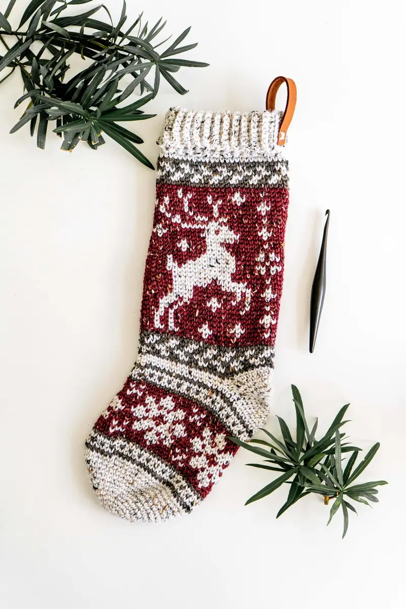 Prancing Deer Holiday Stocking in burgundy and cream with a deer and snowflakes