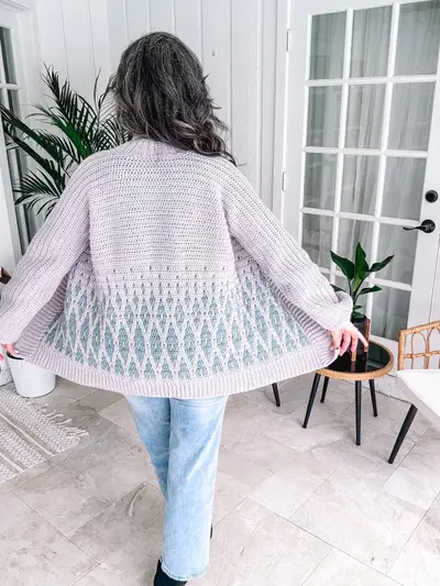 Back view of the lavender Seabird Mosaic Cardi showing the mosaic colorwork