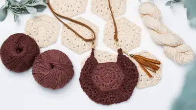 Brown Seven Hexi Granny Bag with cream hexagons and skeins of yarn