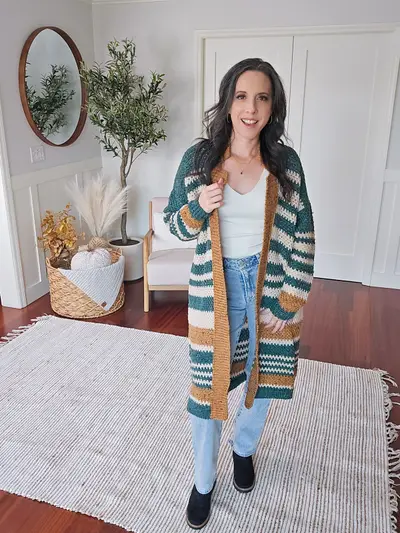 Full length view of the teal and gold striped Shortbread Crochet Duster