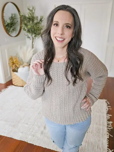 Smiling woman in the oatmeal Toasty Wheat Crochet Pullover