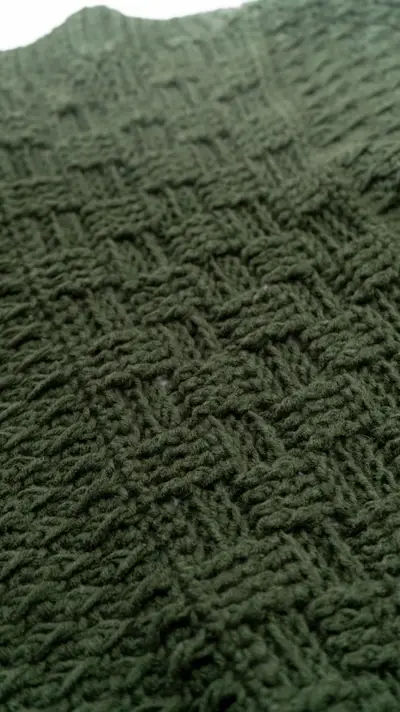 Close up of the basketweave texture on the green Totally Textured Crochet Blanket