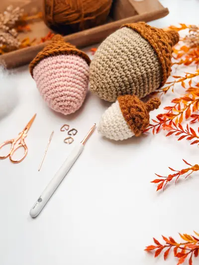Wheat Stitch Acorns in pink, tan and cream with crochet supplies