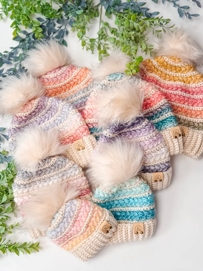 Wheat Stitch Crochet Beanies in pastel stripes with faux fur pom poms