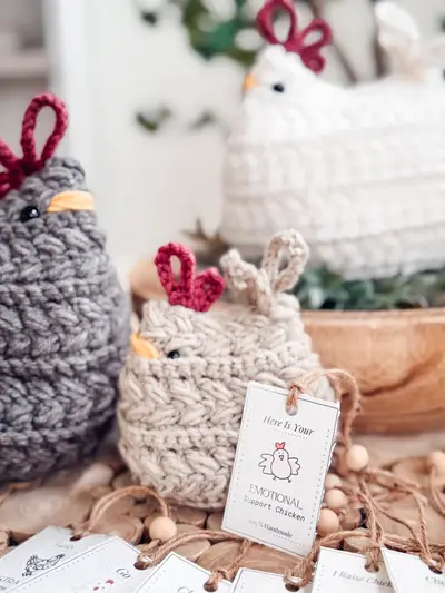 Gray and white Wheat Stitch Crochet Chickens with tags on wood slices
