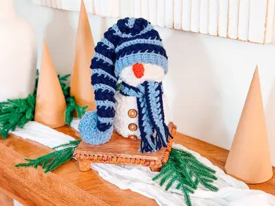 Wheat Stitch Crochet Snowman with a long blue striped stocking hat