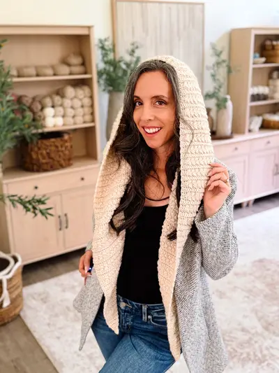 Cream Wheat Stitch Hooded Scarf with long front panels worn over a coat