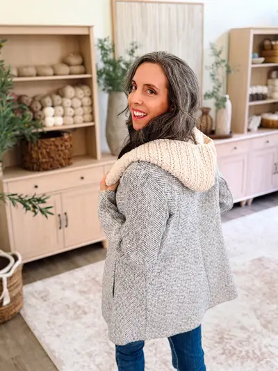 Back view of the cream Wheat Stitch Hooded Scarf's hood
