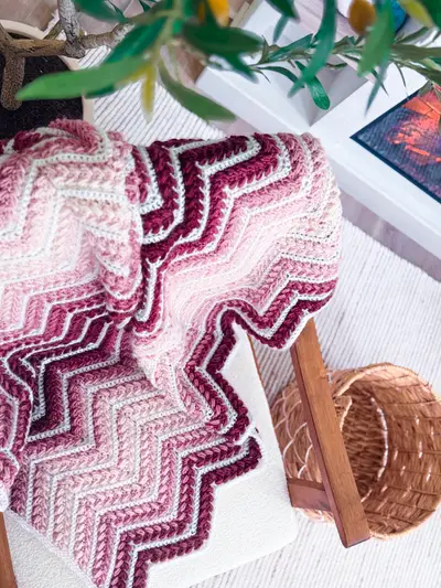 Close up of the burgundy, rose and white ripple stripes