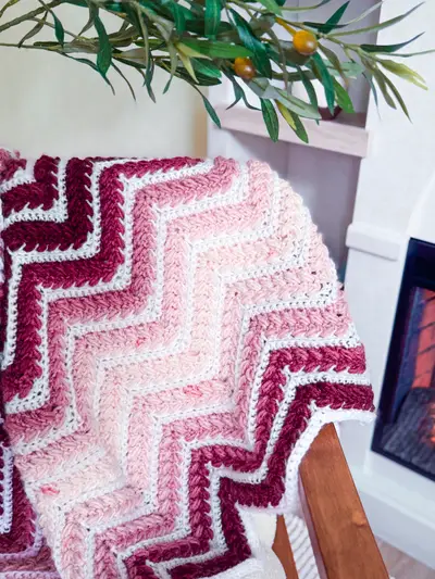 Wheat Stitch Ripple Blanket chevrons in burgundy and pink