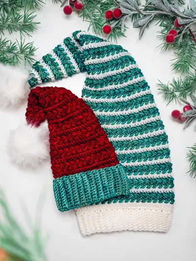 Teal striped Wheat Stitch Elf Hat and red Santa Hat with white pom poms