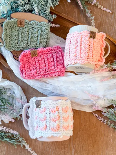 Wheat Stitch Scalloped Mug Cozies in sage, pink and white on mugs
