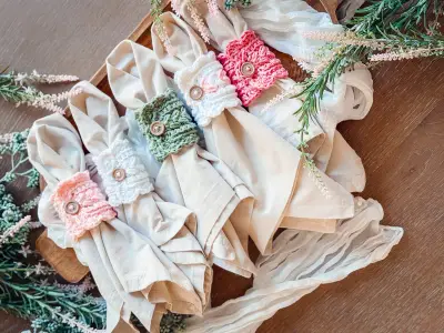 Cloth napkins wrapped with Wheat Stitch Scalloped Napkin Rings
