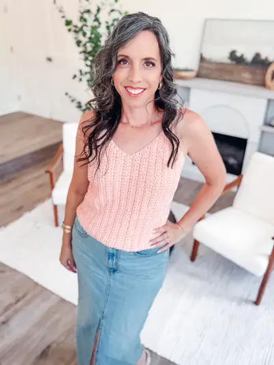 Woman wearing a peach Wheat Stitch Tank Top with jeans